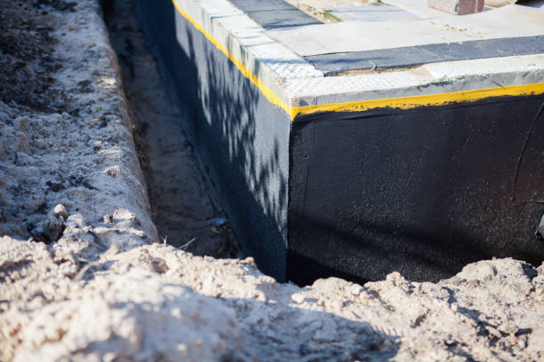 Professional Waterproofing technician working in Clinton, KY